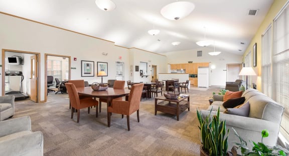 Clubhouse with multiple sitting areas at Horace Mann Apartments and Townhomes in Gary, IN