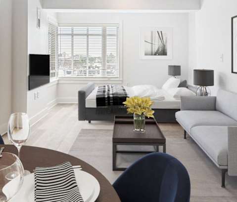 a living room with a couch and a table