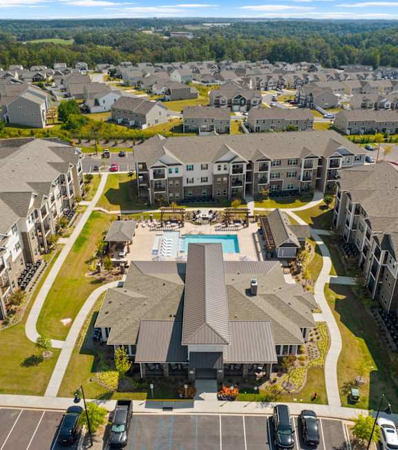an aerial view of a construction site in a suburban neighborhood