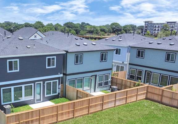 a house with a wooden deck