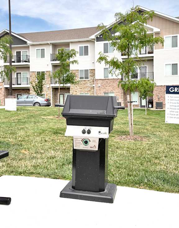 an image of a mailbox in front of an apartment building
