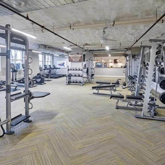 the gym at the flats at big tex apartments