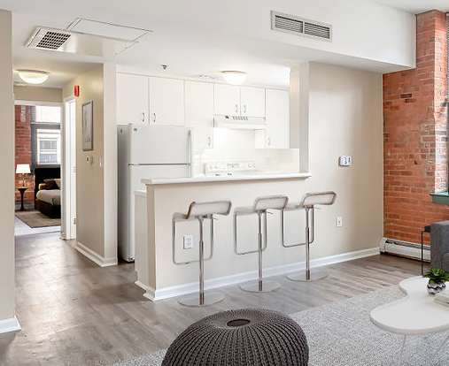 a living room with a couch and a table