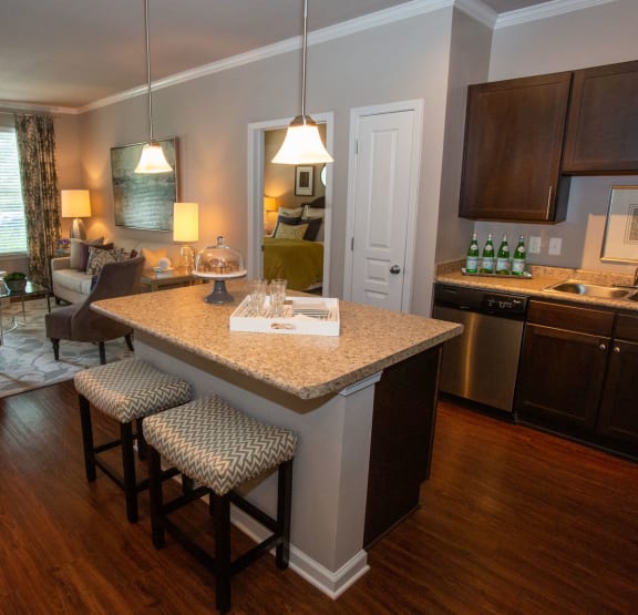 an open floor plan with a kitchen and living room