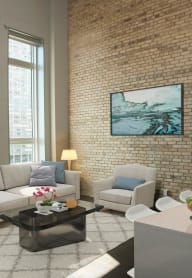 brick living room island at Custom House, Saint Paul, 55101