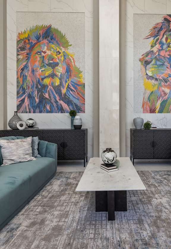 a living room filled with furniture and a large painting of a lion