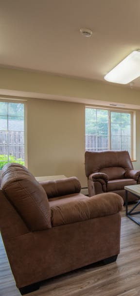 a living room with couches and a coffee table