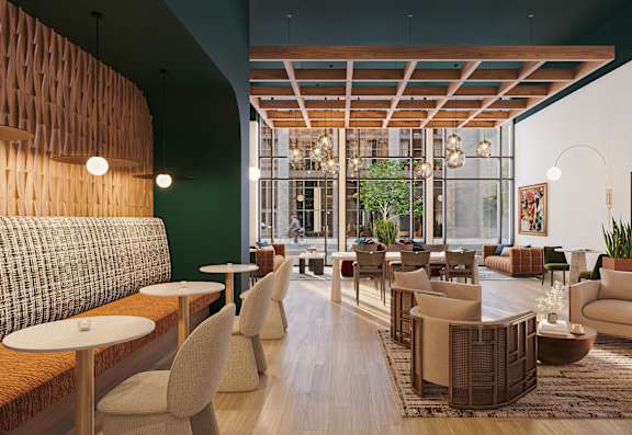 Modern cafe with TV at Textile Lofts Apartments, Cincinnati, Ohio