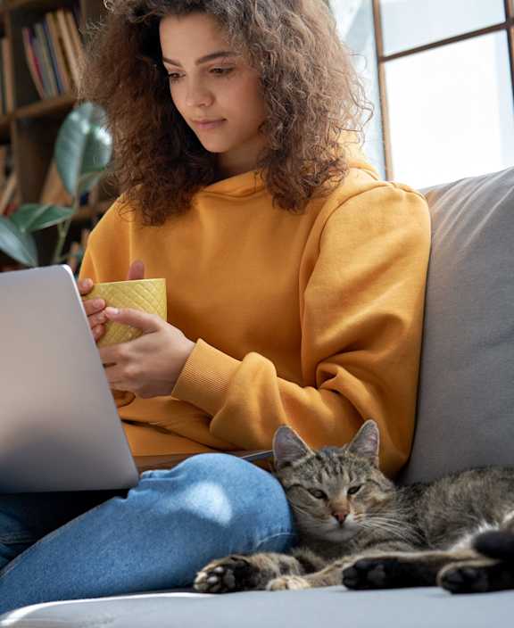 stock photo happy couple with a dog in their new home