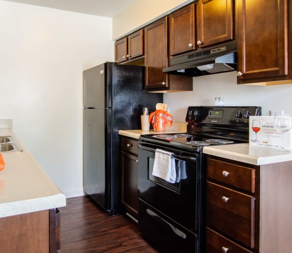 Kitchen with Black Appliances at Hamilton Square Apartments, Westfield, IN