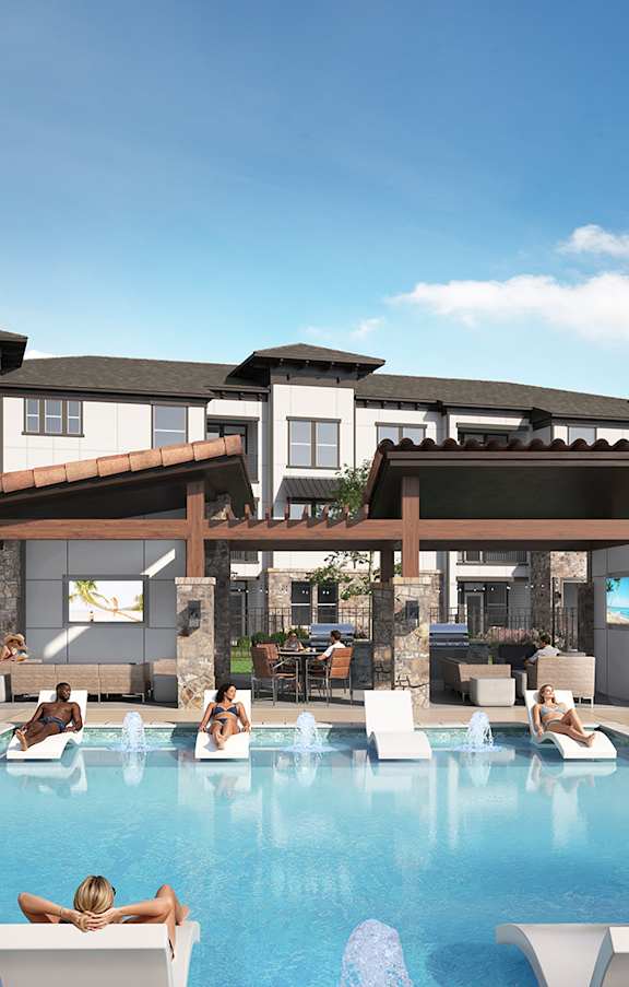 A group of people are sunbathing and relaxing by a pool in front of a resort.