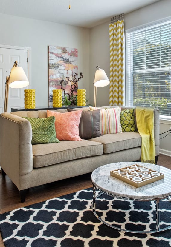 Spaciou Living Room with Natural Light and Ceiling Fan at Tattersall Apartments in Chesapeake, Virginia