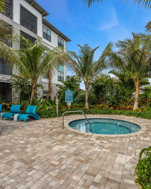 Pool area with sundeck at AxisOne, Stuart, FL