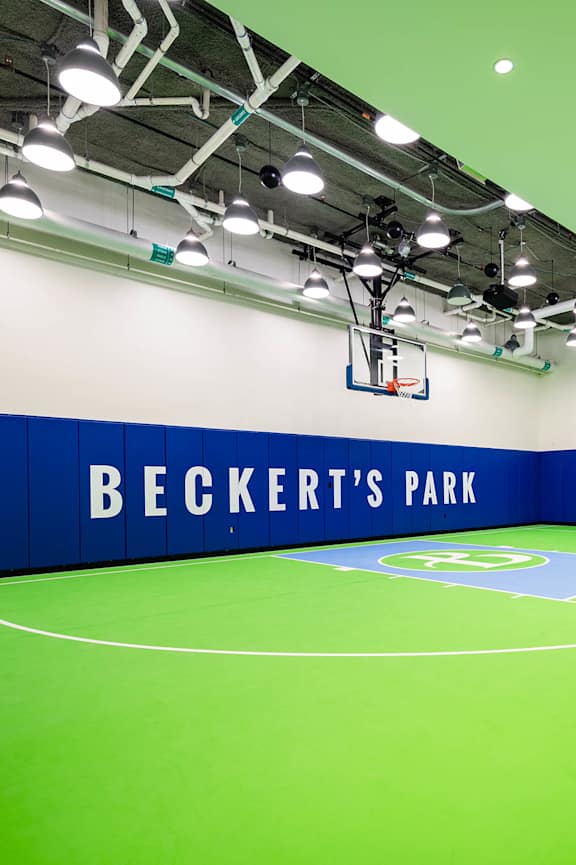 a basketball court in the gym at beckers park