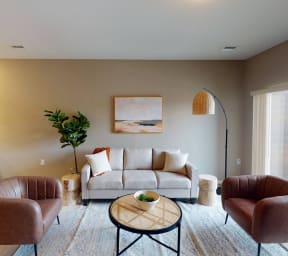 a living room with a couch and a table