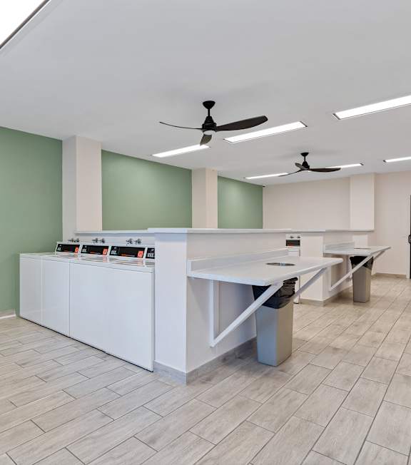 a break room with a counter and a vending machine