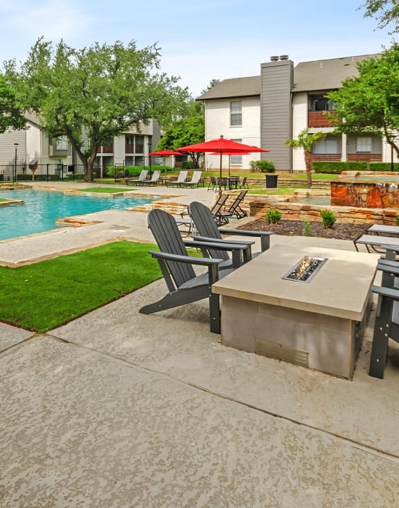 Poolside firepit at Autummwood Apartment Homes in Arlington, TX.