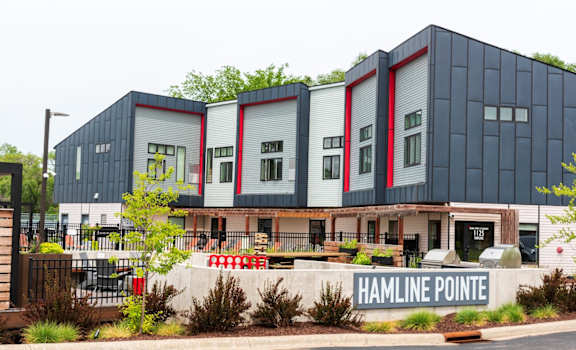 Hamline Pointe is a modern building with a combination of blue and white colors.