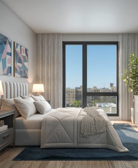a bedroom with a bed and a window