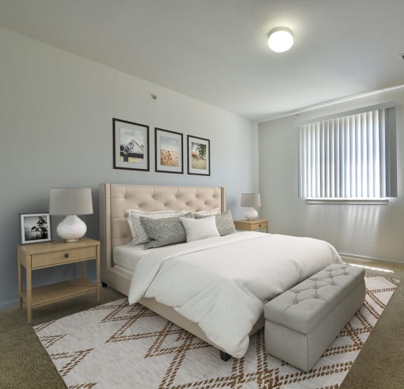 a bedroom with a bed and a ceiling fan at Thornridge Apartments, Grand Blanc, 48439