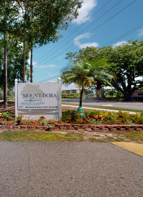 Property sign at entrace of Mount Dora Apartments