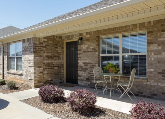 a patio at The Oakley at Deerfield Apartments in Florence, AL
