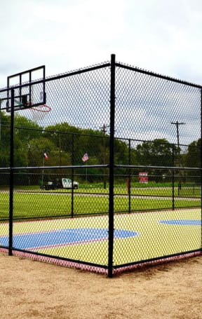 a basketball court at the park