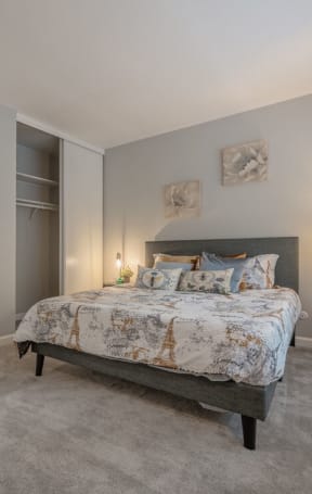 a bedroom with a bed and a door to a living room at Danville Park, Danville, California