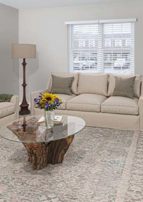 a living room with a couch and a table