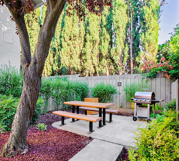 a yard with a fence and a swimming pool  at Pleasanton Place, California, 94566