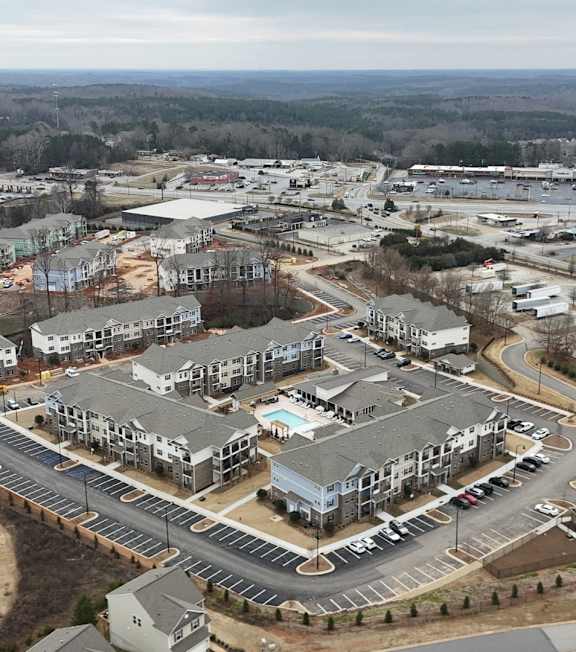 an aerial view of a construction site in a suburban neighborhood