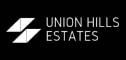 the logo for union hills estates on a black background