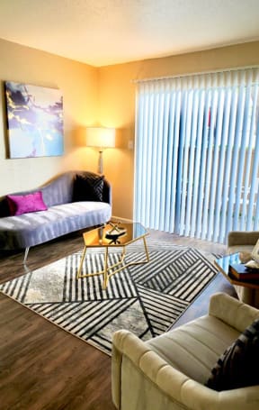 a living room with two couches and a coffee table