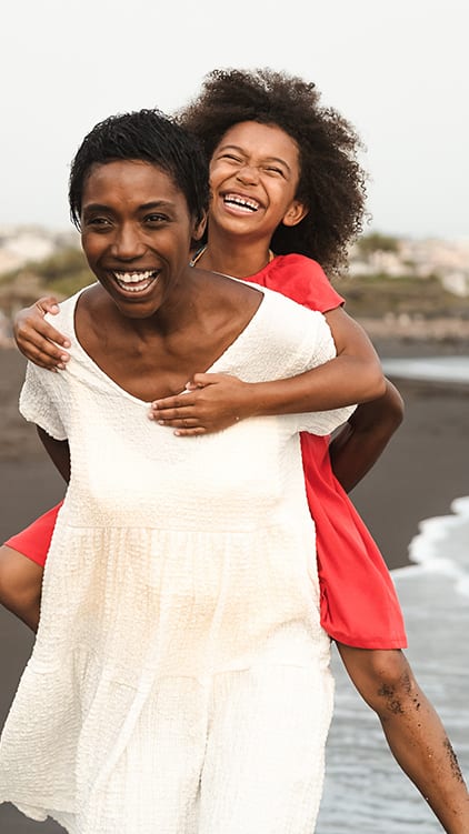 Lifestyle photo of mother and daughter at the beach at Monterey Pointe, Homestead, FL