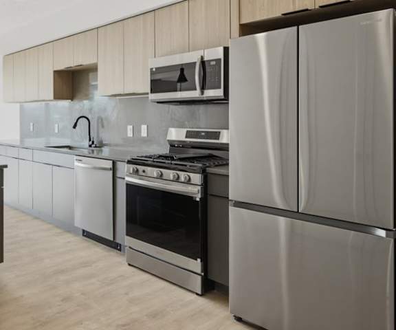 Kitchen with Large Refrigerator3 at Brickside Heights, Millcreek, Utah
