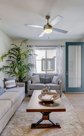 a living room with a couch and a coffee table