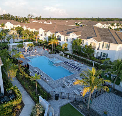 a aerial view of the pool at the resort at longboat key club at The Crest at Laurel Canyon Apartments, Naples, Florida