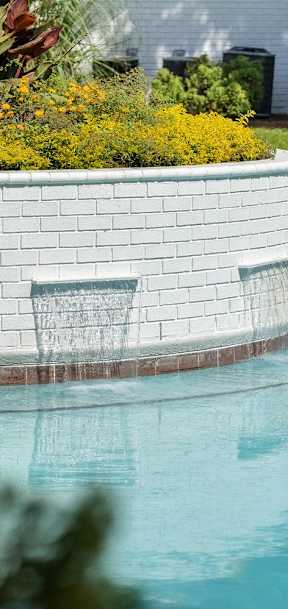 a swimming pool in a backyard with a patio and chairs at Dothan Farms, Dothan, AL, 36305