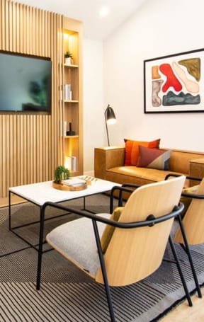 a living room with a couch and a television at Parc Medallion LLC, California, 94587
