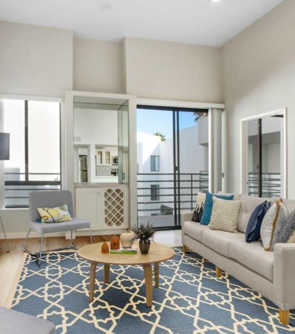 a living room with a couch and a coffee table