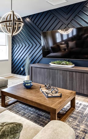 Living area with TV at Sandstone Villas Apartments, Omaha