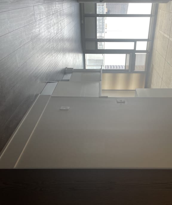 From the entry way looking into the living room area you immediately see breath taking views of the city.