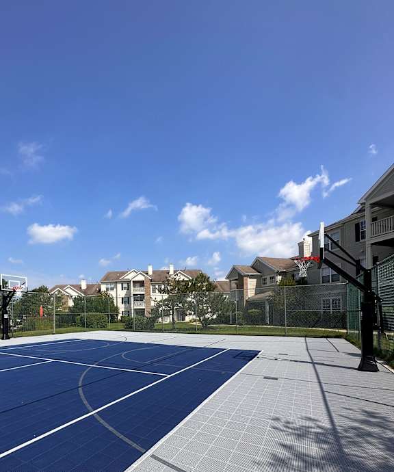a view of the side of a building with the sky in the background at Landings at Amhurst Lake Apartments, Waukegan, IL