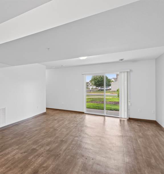 a bedroom with a bed and a ceiling fan