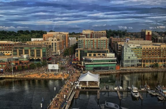 a view of a city from above with boats in the water  at Andrews Ridge Apartments, Suitland, MD, 20746
