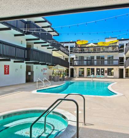 a swimming pool in the middle of a building with a pool