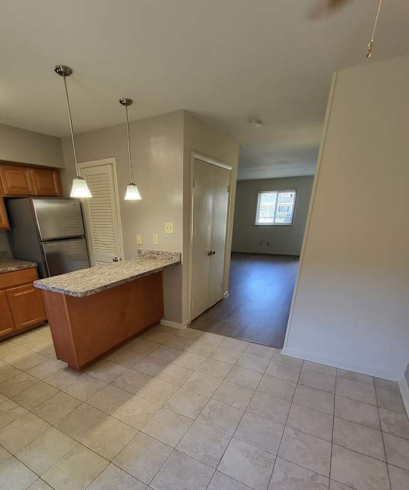 a look down into the kitchen from the loft