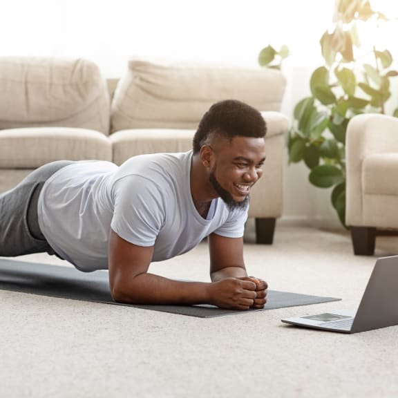 Man Working Out at Home Smiling