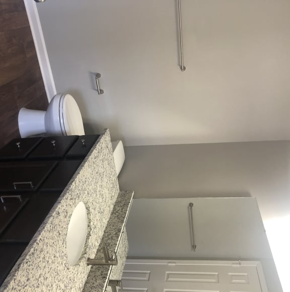bathroom with granite countertop