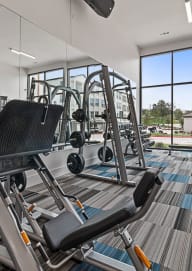 Fitness center leg press at Reveal at Onion Creek, Austin, TX